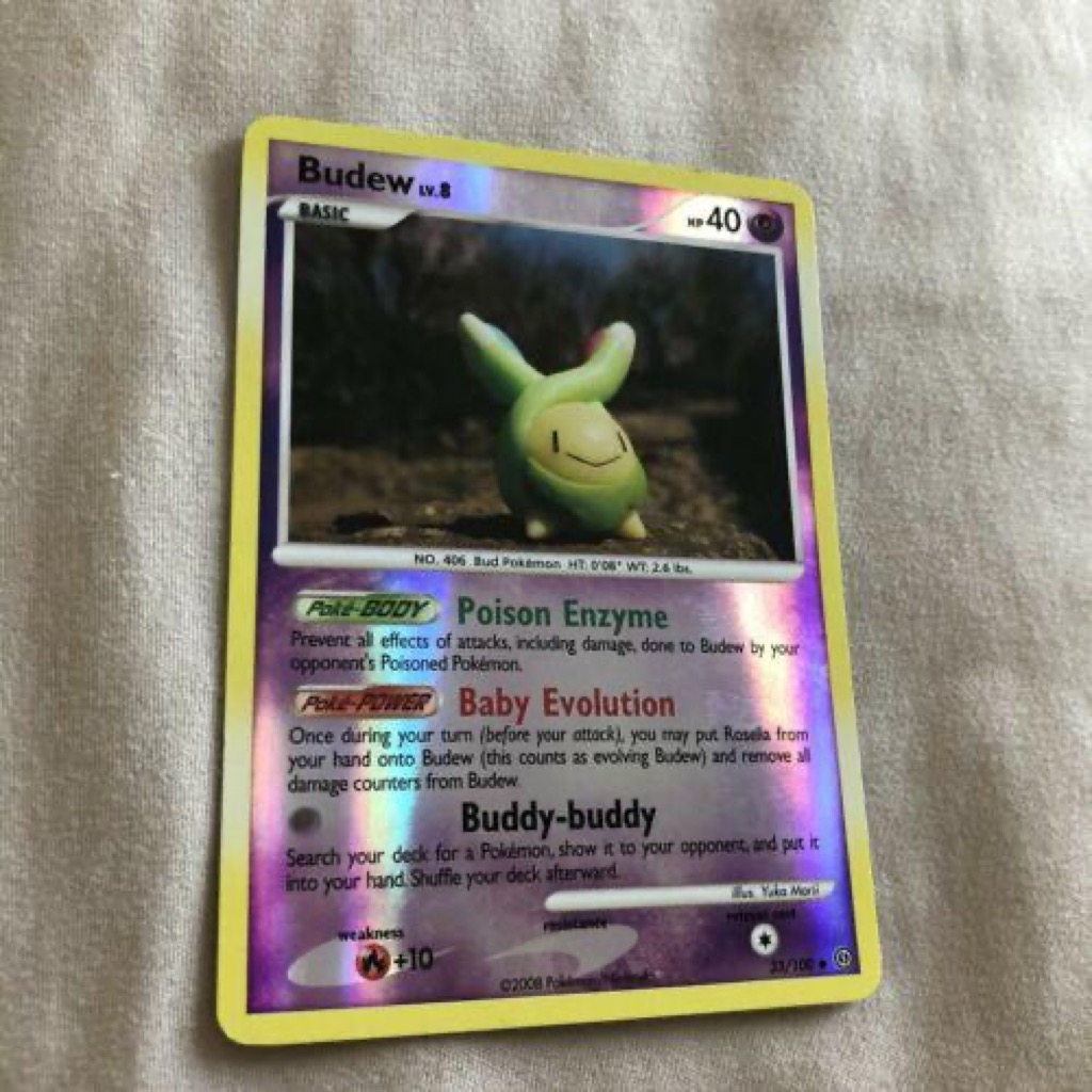 Reverse Holo Budew 33/100, Stormfront Pokémon card