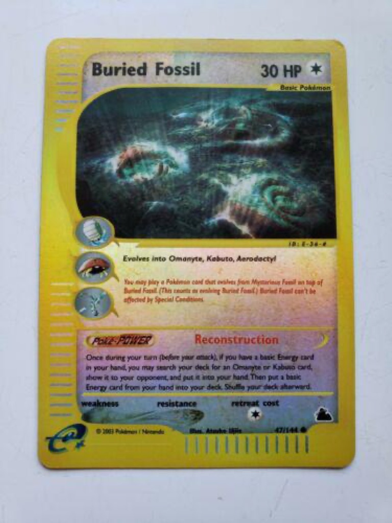 Reverse Holo Buried Fossil 47/144, Skyridge Pokémon card