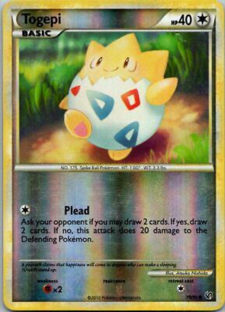 Reverse Holo Togepi 70/90, HS—Undaunted Pokémon card